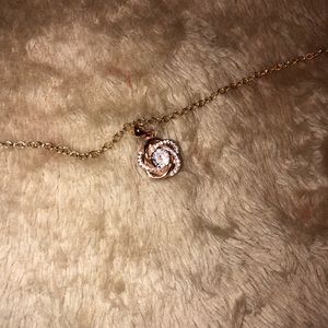Golden Macy’s rose necklace